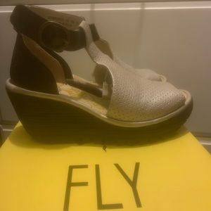 Silver/black Fly London wedge.